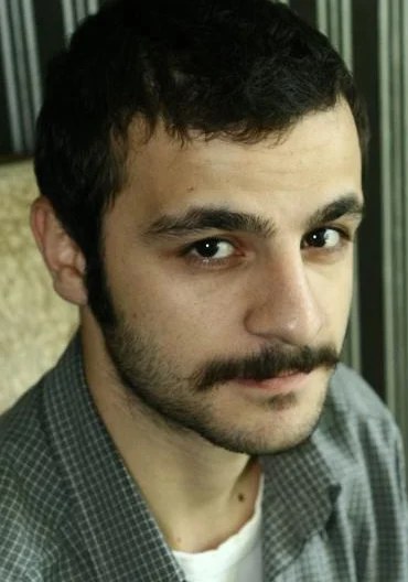 古文·穆拉特·阿克皮纳尔 Güven Murat Akpinar