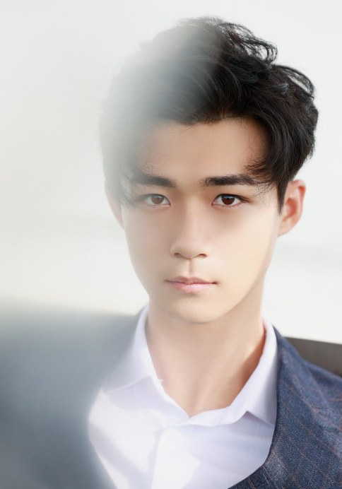 郭笑天 Xiaotian Guo