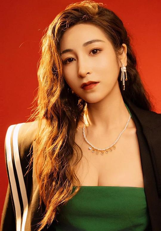 穆青 Qing Mu